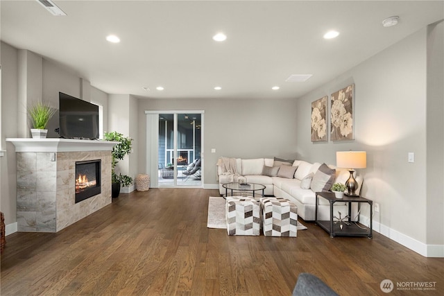 18611 134th St E, Bonney Lake, WA 98391 - living area featuring a tile fireplace, recessed lighting, and wood finished floors
