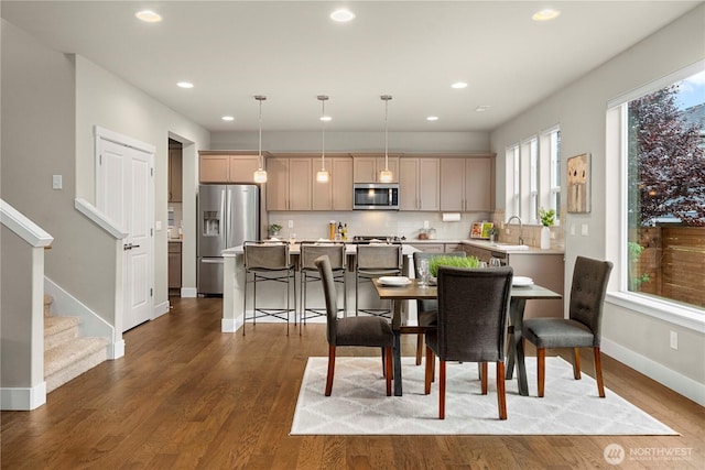 18611 134th St E, Bonney Lake, WA 98391 - dining space with recessed lighting, wood finished floors, and stairway