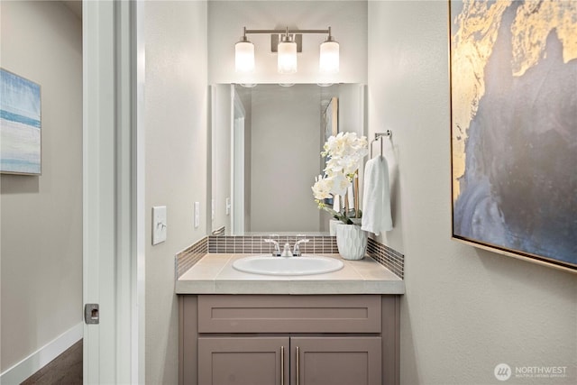 18611 134th St E, Bonney Lake, WA 98391 - bathroom featuring vanity, wood finished floors, and backsplash