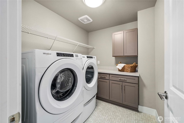 18611 134th St E, Bonney Lake, WA 98391 - laundry area with washing machine and clothes dryer and cabinet space