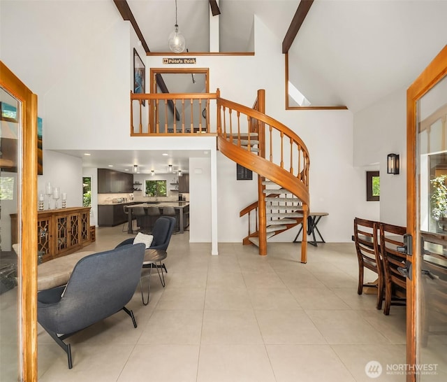25112 SE 17th St, Sammamish, WA 98075 - living room featuring high vaulted ceiling, stairs, and light tile patterned floors