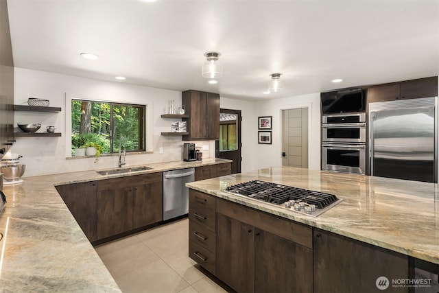 25112 SE 17th St, Sammamish, WA 98075 - kitchen with open shelves, appliances with stainless steel finishes, dark brown cabinets, and recessed lighting