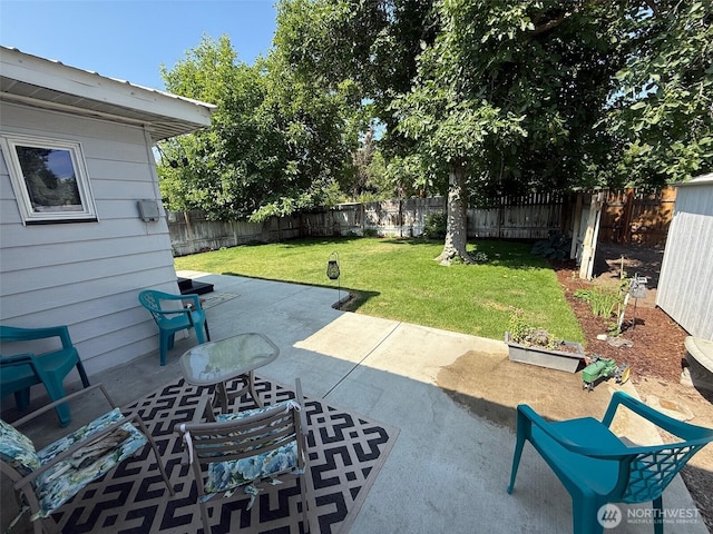 416 Cedar St S, Omak, WA 98841 - fenced backyard with a patio area
