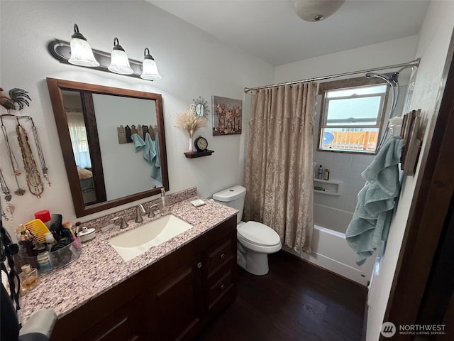 416 Cedar St S, Omak, WA 98841 - bathroom featuring shower / bathtub combination with curtain, vanity, and wood finished floors