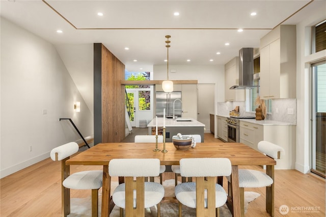 4615 2nd Ave NE, Seattle, WA 98105 - dining room featuring light wood-type flooring and recessed lighting
