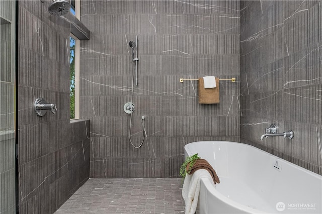 4615 2nd Ave NE, Seattle, WA 98105 - bathroom featuring tiled shower and a freestanding bath
