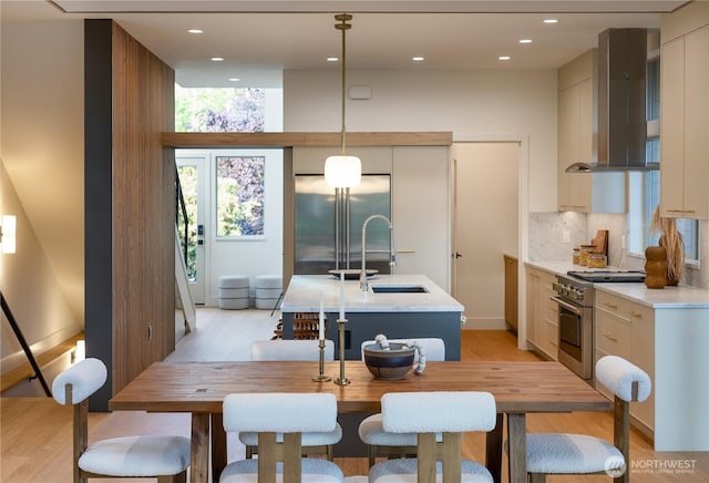 4615 2nd Ave NE, Seattle, WA 98105 - dining room featuring light wood-style floors and recessed lighting