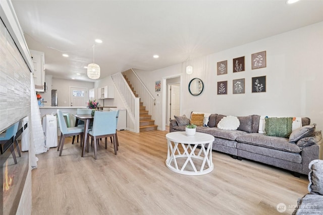 3628 S Sheridan Ave, Tacoma, WA 98418 - living area featuring stairs, recessed lighting, light wood-style flooring, and a glass covered fireplace