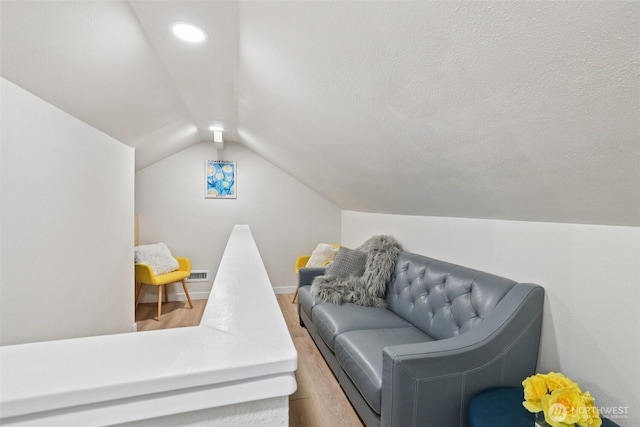 3628 S Sheridan Ave, Tacoma, WA 98418 - sitting room featuring wood finished floors, lofted ceiling, and recessed lighting