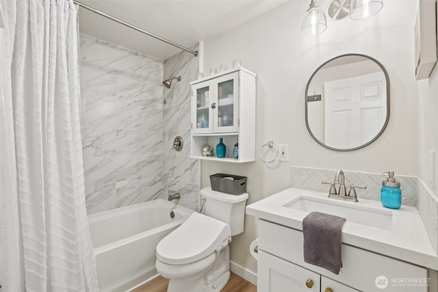 3628 S Sheridan Ave, Tacoma, WA 98418 - bathroom with shower / tub combo with curtain, vanity, tasteful backsplash, and wood finished floors