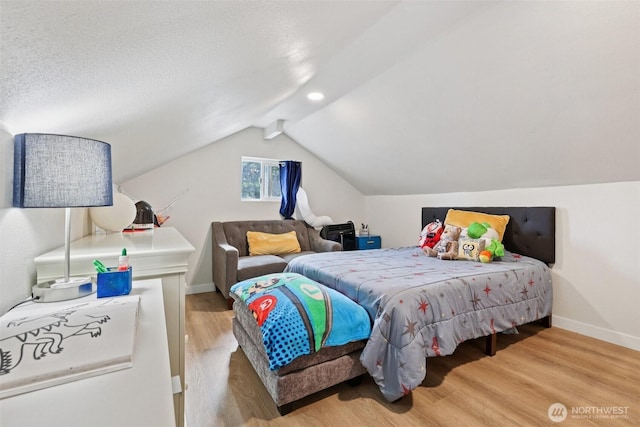3628 S Sheridan Ave, Tacoma, WA 98418 - bedroom featuring wood finished floors and lofted ceiling
