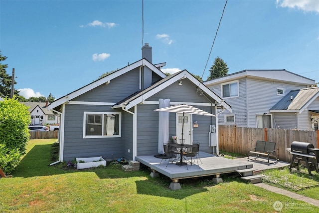 3628 S Sheridan Ave, Tacoma, WA 98418 - rear view of house featuring a wooden deck and a chimney