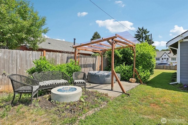 3628 S Sheridan Ave, Tacoma, WA 98418 - fenced backyard featuring an outdoor fire pit, a patio, and a pergola
