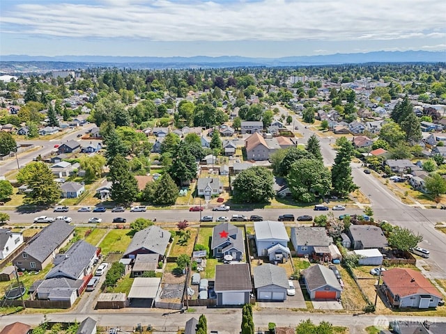 3628 S Sheridan Ave, Tacoma, WA 98418 - aerial perspective of suburban area featuring mountains