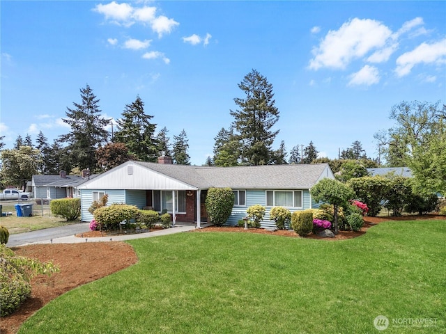 8718 Dresden Ln SW, Lakewood, WA 98498 - ranch-style home with a front lawn and a chimney