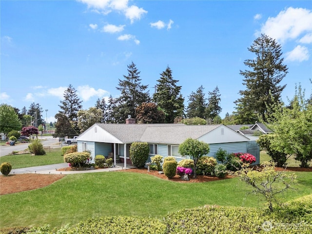 8718 Dresden Ln SW, Lakewood, WA 98498 - single story home with a front yard and a chimney