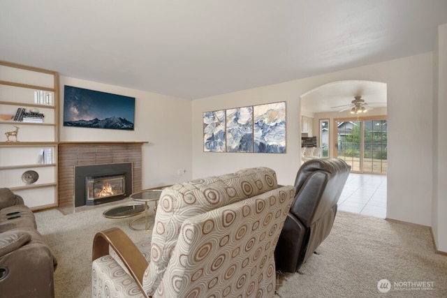 8718 Dresden Ln SW, Lakewood, WA 98498 - living area with carpet floors, a brick fireplace, and ceiling fan
