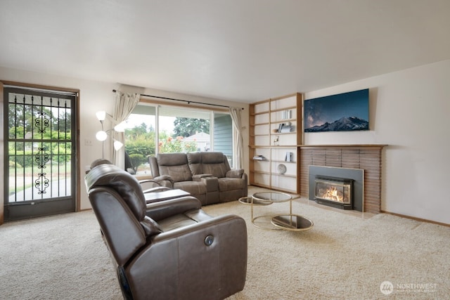 8718 Dresden Ln SW, Lakewood, WA 98498 - living area with carpet floors, plenty of natural light, and a brick fireplace