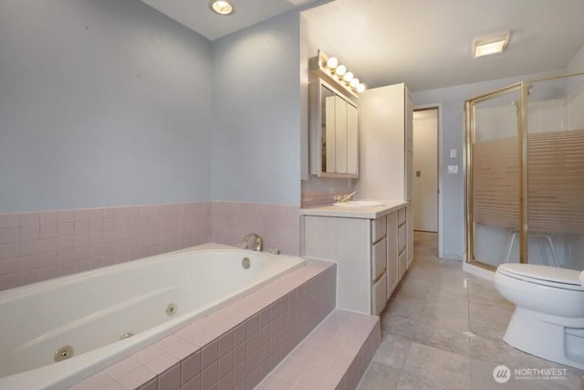 8718 Dresden Ln SW, Lakewood, WA 98498 - full bath featuring a jetted tub, vanity, a shower stall, and tile patterned flooring