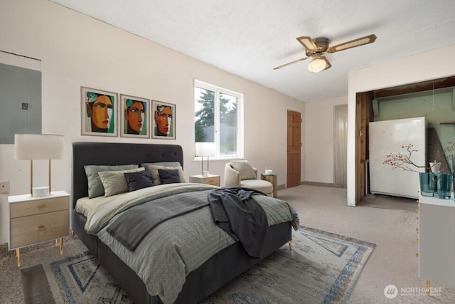 8718 Dresden Ln SW, Lakewood, WA 98498 - carpeted bedroom featuring freestanding refrigerator and a ceiling fan