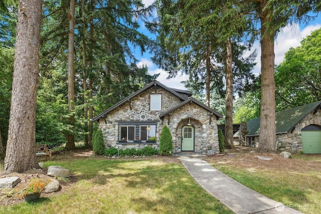 8038 S Ainsworth Ave, Tacoma, WA 98408 - view of front of house featuring stone siding and a front lawn