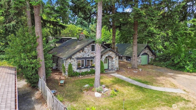 8038 S Ainsworth Ave, Tacoma, WA 98408 - view of front of property with stone siding and a chimney