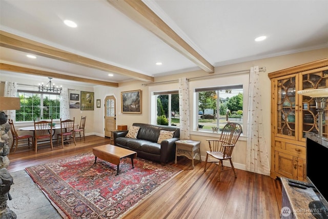 8038 S Ainsworth Ave, Tacoma, WA 98408 - living room with wood-type flooring, beam ceiling, crown molding, a chandelier, and recessed lighting