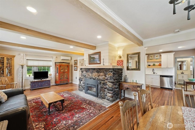 8038 S Ainsworth Ave, Tacoma, WA 98408 - living room featuring hardwood / wood-style flooring, a wall mounted AC, crown molding, recessed lighting, and beamed ceiling