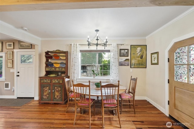 8038 S Ainsworth Ave, Tacoma, WA 98408 - dining area featuring a chandelier, ornamental molding, plenty of natural light, and wood finished floors