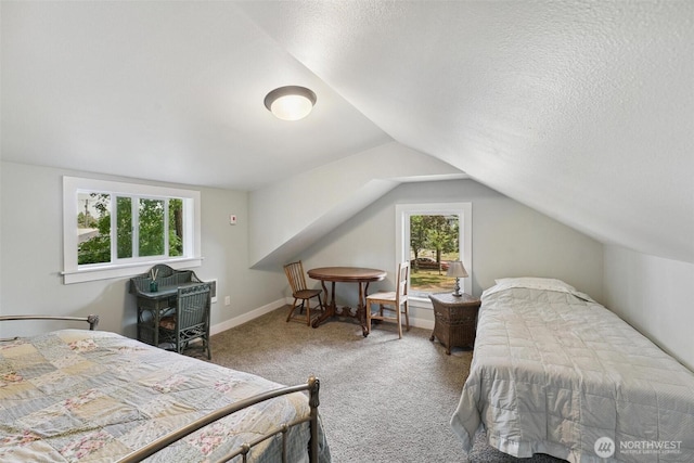 8038 S Ainsworth Ave, Tacoma, WA 98408 - bedroom featuring carpet flooring, vaulted ceiling, multiple windows, and a textured ceiling