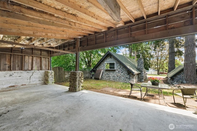 8038 S Ainsworth Ave, Tacoma, WA 98408 - view of patio / terrace with an outdoor structure and outdoor dining area