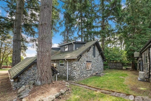 8038 S Ainsworth Ave, Tacoma, WA 98408 - view of side of home with stone siding and a chimney
