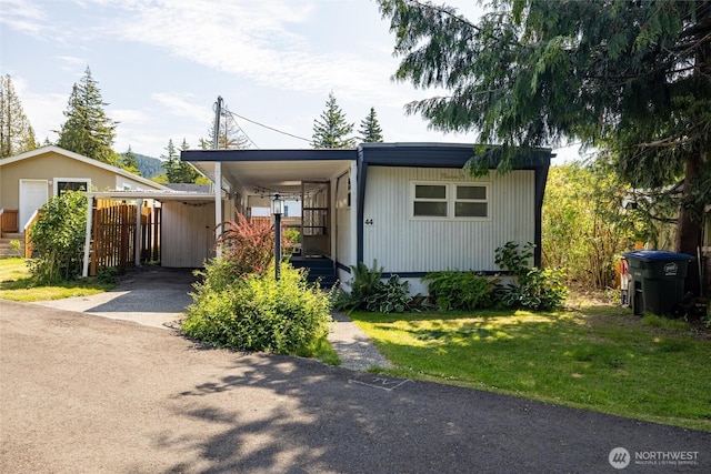 2500 Samish Way Unit 44, Bellingham, WA 98229 - manufactured / mobile home featuring driveway, a carport, and a front lawn