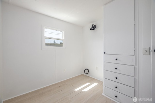 2500 Samish Way Unit 44, Bellingham, WA 98229 - unfurnished bedroom featuring light wood finished floors and baseboards