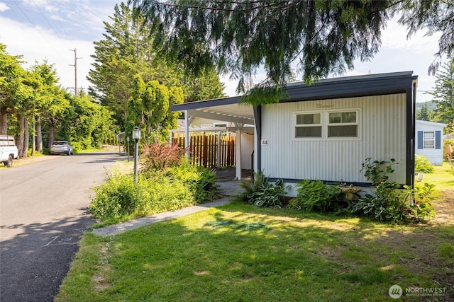 2500 Samish Way Unit 44, Bellingham, WA 98229 - manufactured / mobile home featuring asphalt driveway and a carport