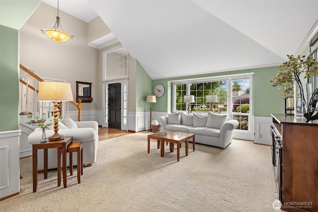 14809 283rd Pl NE, Duvall, WA 98019 - living area featuring a wainscoted wall, carpet, high vaulted ceiling, and a decorative wall