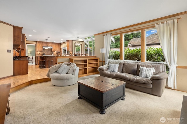 14809 283rd Pl NE, Duvall, WA 98019 - living room featuring recessed lighting, crown molding, and light colored carpet