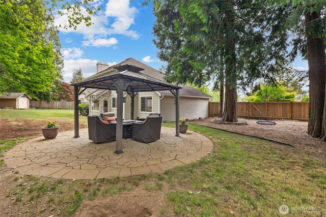 14809 283rd Pl NE, Duvall, WA 98019 - fenced backyard featuring a gazebo, a patio area, a storage shed, and an outdoor living space