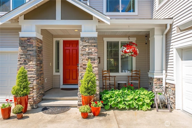6703 Marshall Ave SE, Auburn, WA 98092 - doorway to property with stone siding and covered porch
