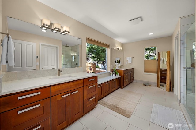 6703 Marshall Ave SE, Auburn, WA 98092 - full bath with a shower stall, vanity, plenty of natural light, and recessed lighting