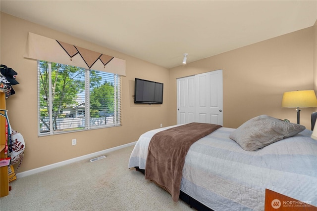 6703 Marshall Ave SE, Auburn, WA 98092 - bedroom with carpet floors and a closet