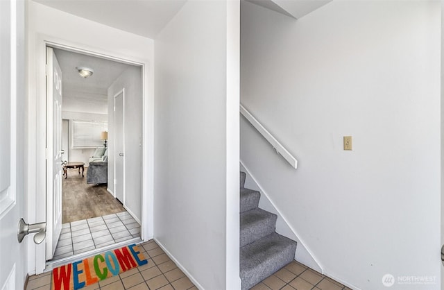 5720 122nd Ave SE Unit 179, Bellevue, WA 98006 - stairway with tile patterned floors