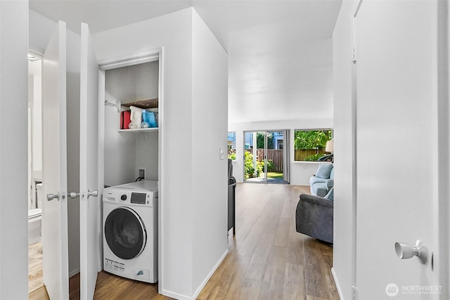 5720 122nd Ave SE Unit 179, Bellevue, WA 98006 - laundry area with washer / dryer and wood finished floors
