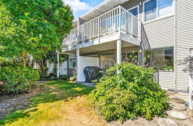 5720 122nd Ave SE Unit 179, Bellevue, WA 98006 - rear view of house with a lawn and a balcony