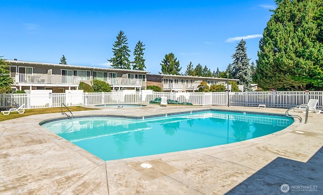 5720 122nd Ave SE Unit 179, Bellevue, WA 98006 - community pool featuring a patio and a community hot tub