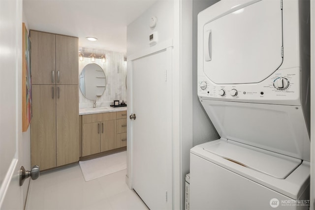 11504 NE 128th Ave Unit 32, Kirkland, WA 98034 - laundry area with stacked washing machine and dryer