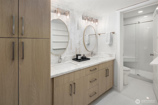 11504 NE 128th Ave Unit 32, Kirkland, WA 98034 - bathroom featuring double vanity and a stall shower