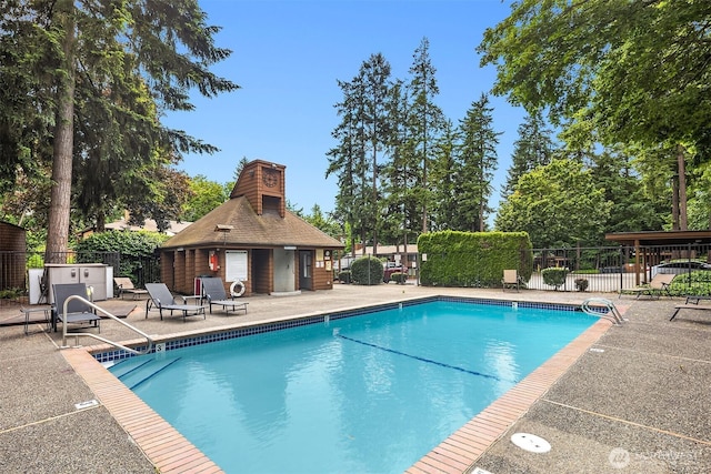 11504 NE 128th Ave Unit 32, Kirkland, WA 98034 - community pool featuring a patio