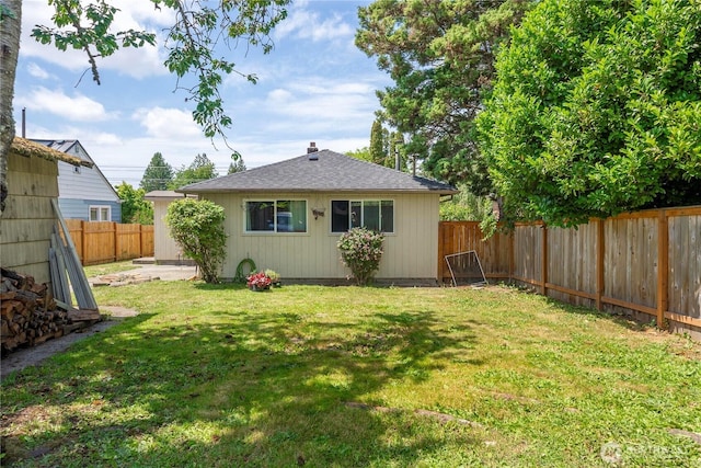 5221 S I St, Tacoma, WA 98408 - rear view of property with a fenced backyard