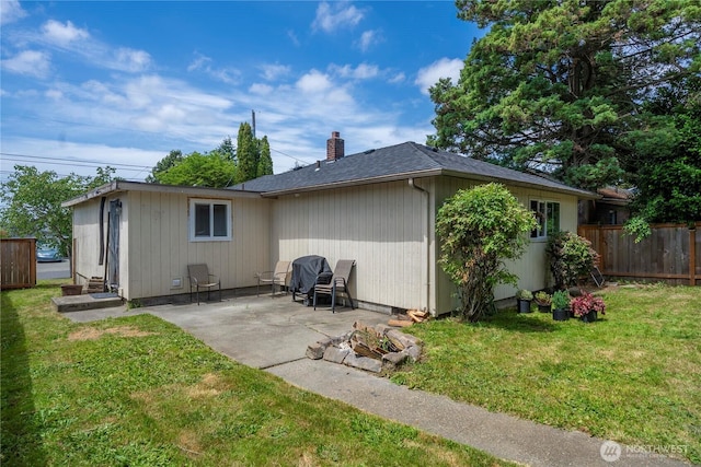 5221 S I St, Tacoma, WA 98408 - rear view of property with a patio area and a chimney
